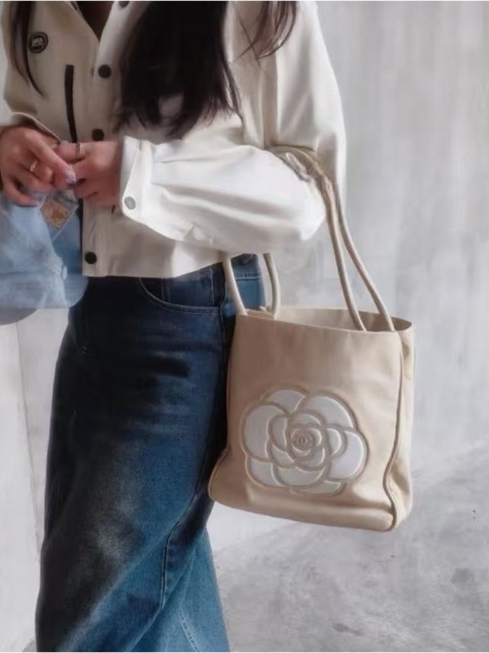 CHANEL Cream Tote with Raised Camellia Appliqué